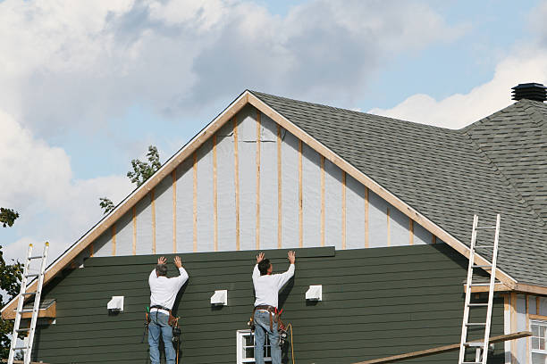 Professional Siding Installation technician working in Columbus, TX